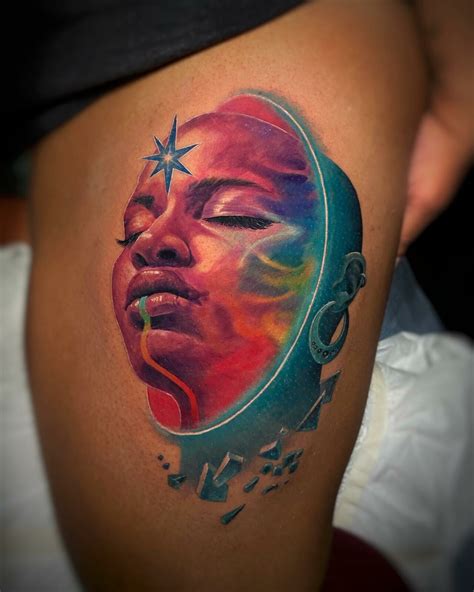 tattoos on brown skin|watercolor tattoo on dark skin.